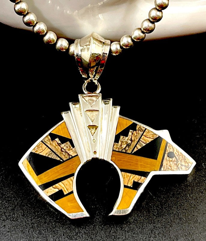 Bear pendant with tiger's eye, Acoma jet and picture jasper inlay
